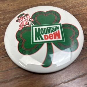 VTG MTN Mountain Dew Pin Back Button Green Clover Leprechaun St. Patrick's Day